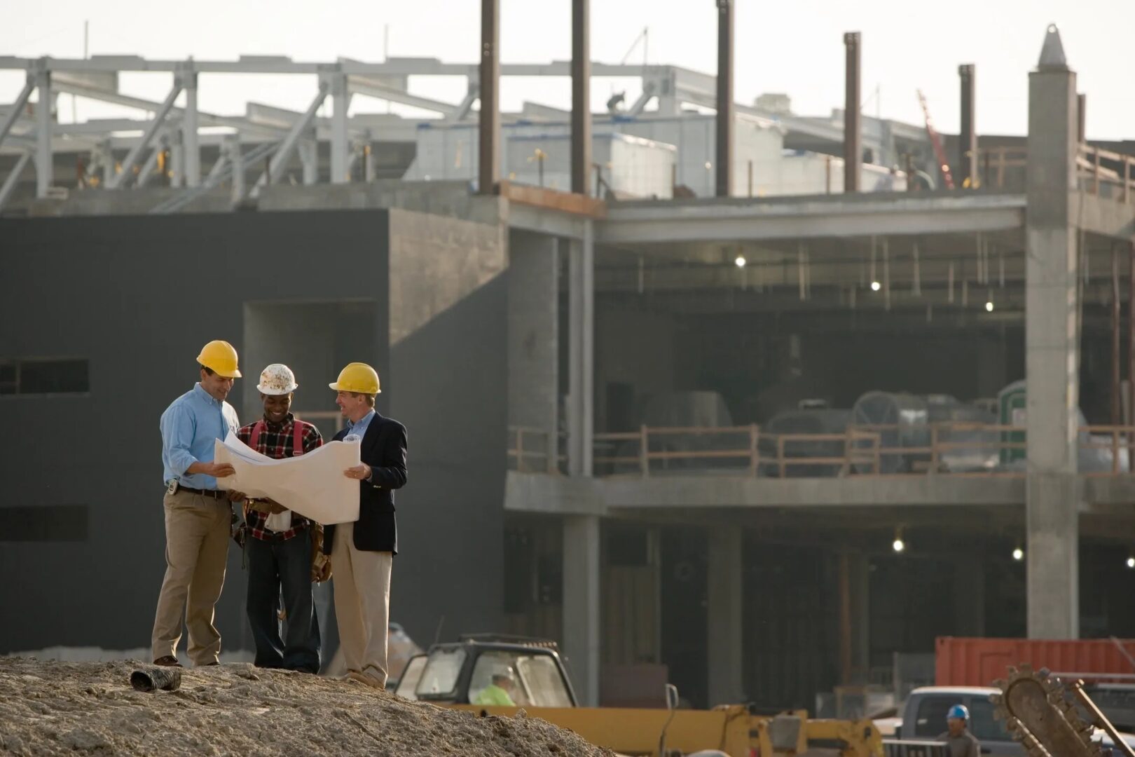 A group of people standing on top of a building.