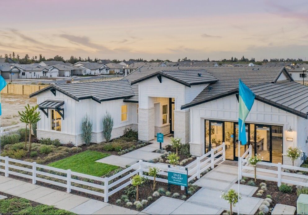 A new home with white walls and blue flags.